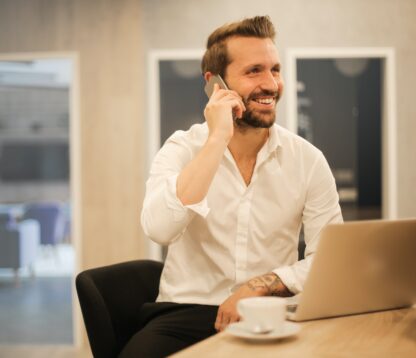 Happy employee on the phone