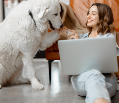 woman happy at home with her dog
