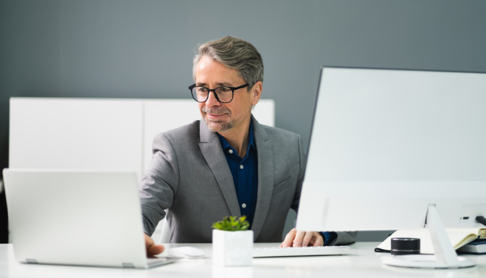 professional man looking at laptop