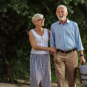 over 55s couple in retirement walking