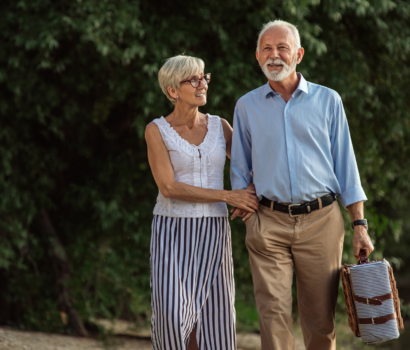 over 55s couple in retirement walking