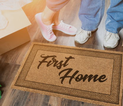 first home image of a doormat. First-time buyers new home