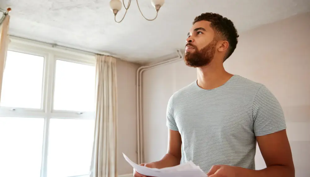 first-time buyer reviewing savings for renovation plans